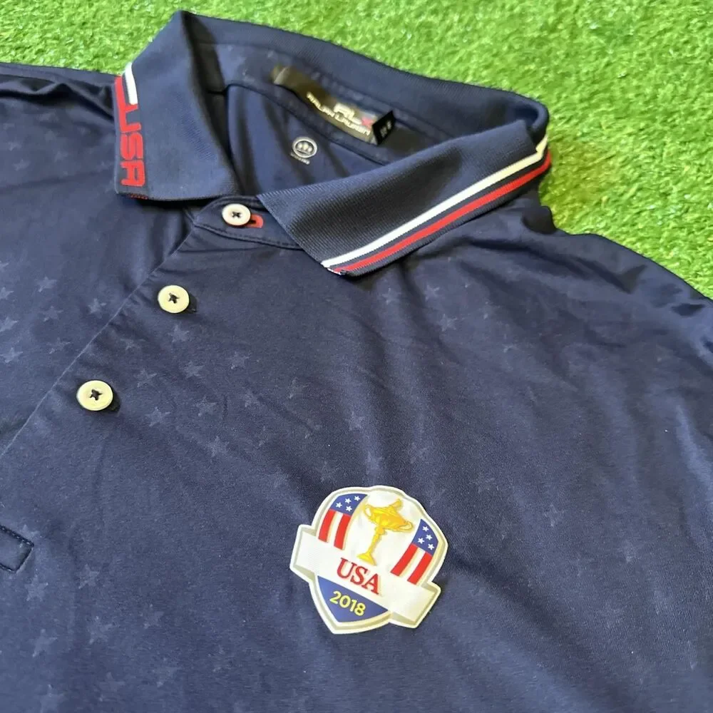 RLX Ralph Lauren Athletic Polo Shirt Mens 2XL Blue USA Open 2018 Patch Flag Logo